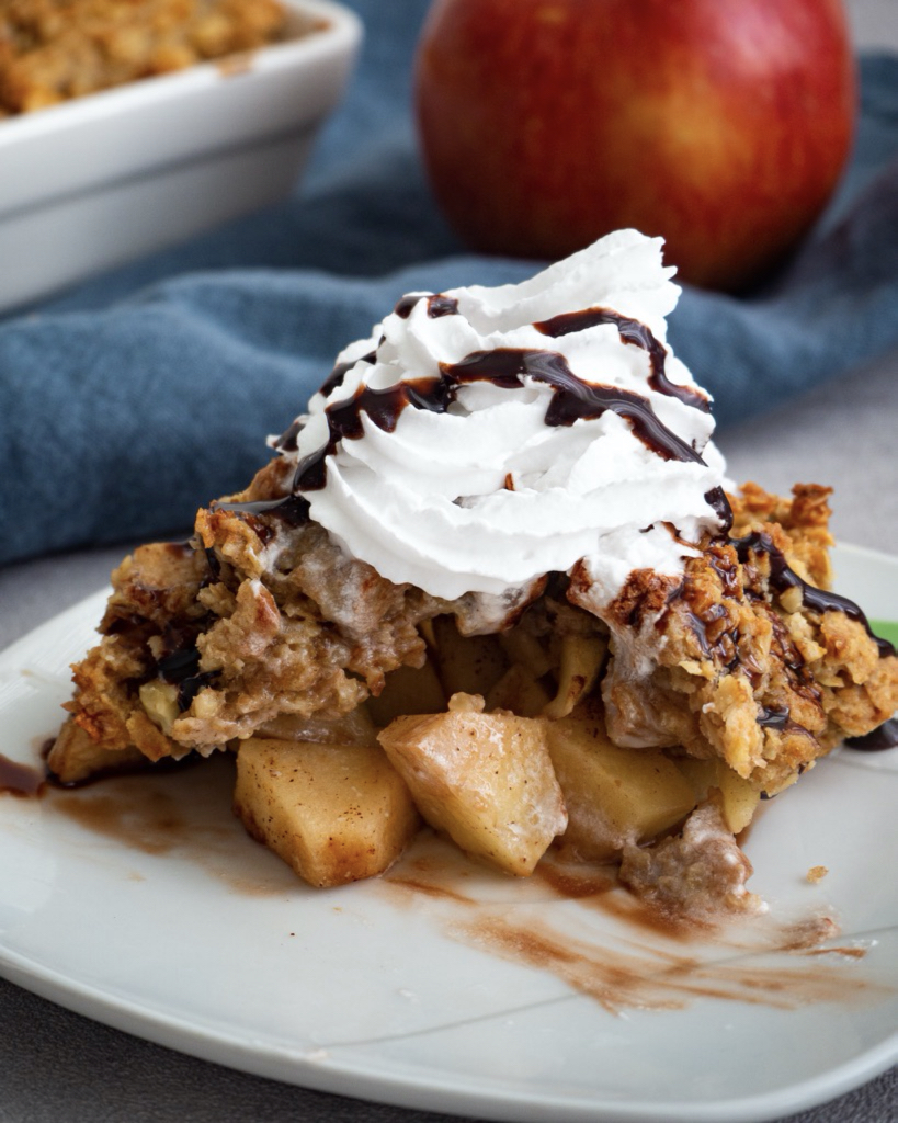 Close Up Apple Crumble with Whipped Cream